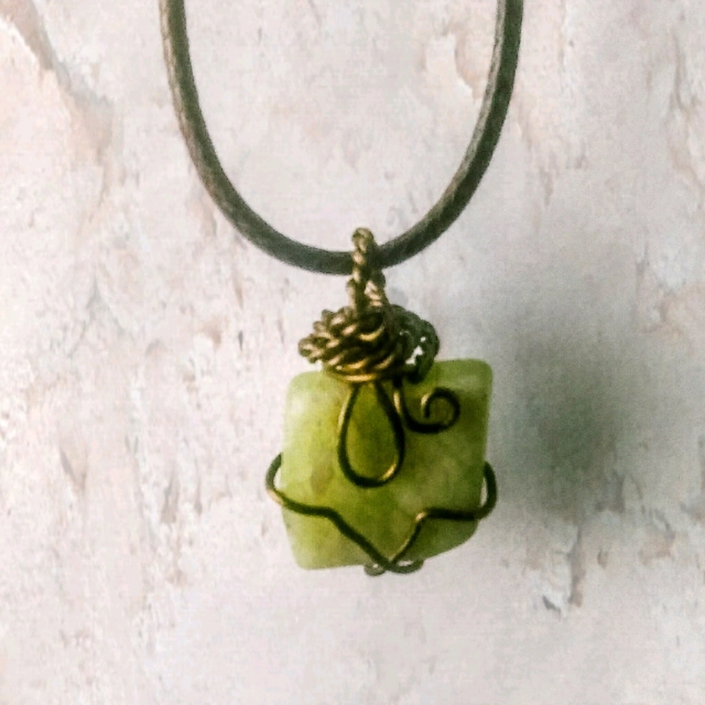 Beautiful green wire wrapped energy stone